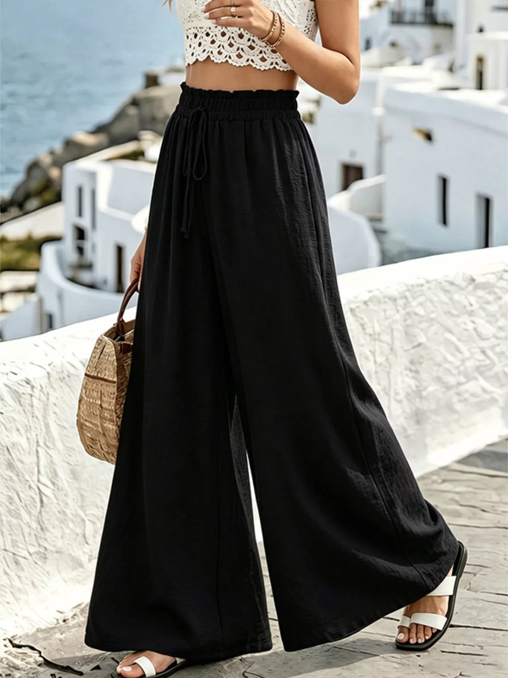Wide leg drawstring pants by Shopimist featuring a relaxed fit, comfortable waistband, and casual style in soft fabric.