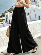 Wide leg drawstring pants by Shopimist featuring a relaxed fit, comfortable waistband, and casual style in soft fabric.