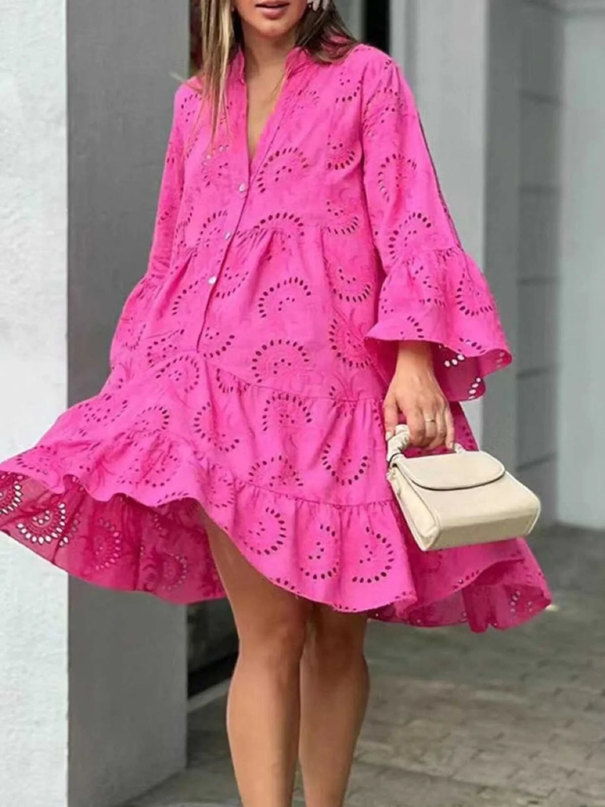 Plus size ruffled hem tiered dress with eyelet details, full length, by Trendsi, featuring a flowy, feminine silhouette.