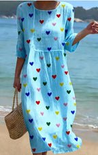 Plus-size patchwork maxi dress by FitiqueFit, relaxed fit casual women's dress with colorful patchwork design and flowing silhouette.