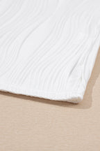 Raina Wavy Textured Tee by Threaded Pear, casual women's top with wavy fabric texture and relaxed fit.