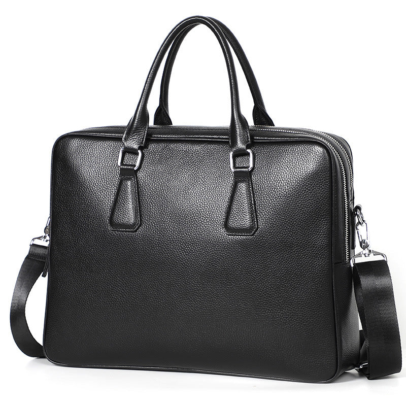 Men's leather briefcase by Plush Fashion Hub, horizontal cowhide handbag with large capacity and sleek design.