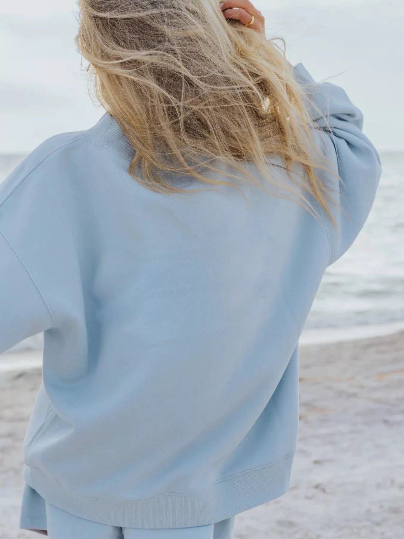 Plush Fashion Hub relaxed fit round neck sweatshirt and shorts set, casual 2-piece loungewear ensemble in soft fabric.
