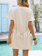 Women's notched flutter sleeve mini dress by Trendsi, casual summer shift dress with a relaxed fit and stylish design.