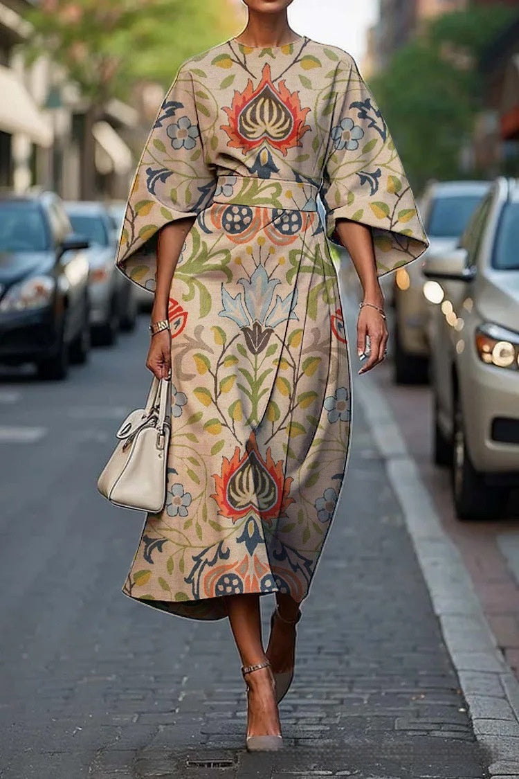 Flowy maxi dress with geometric print, batwing sleeves, casual style from Plush Fashion Hub in XS–XXXL size range.