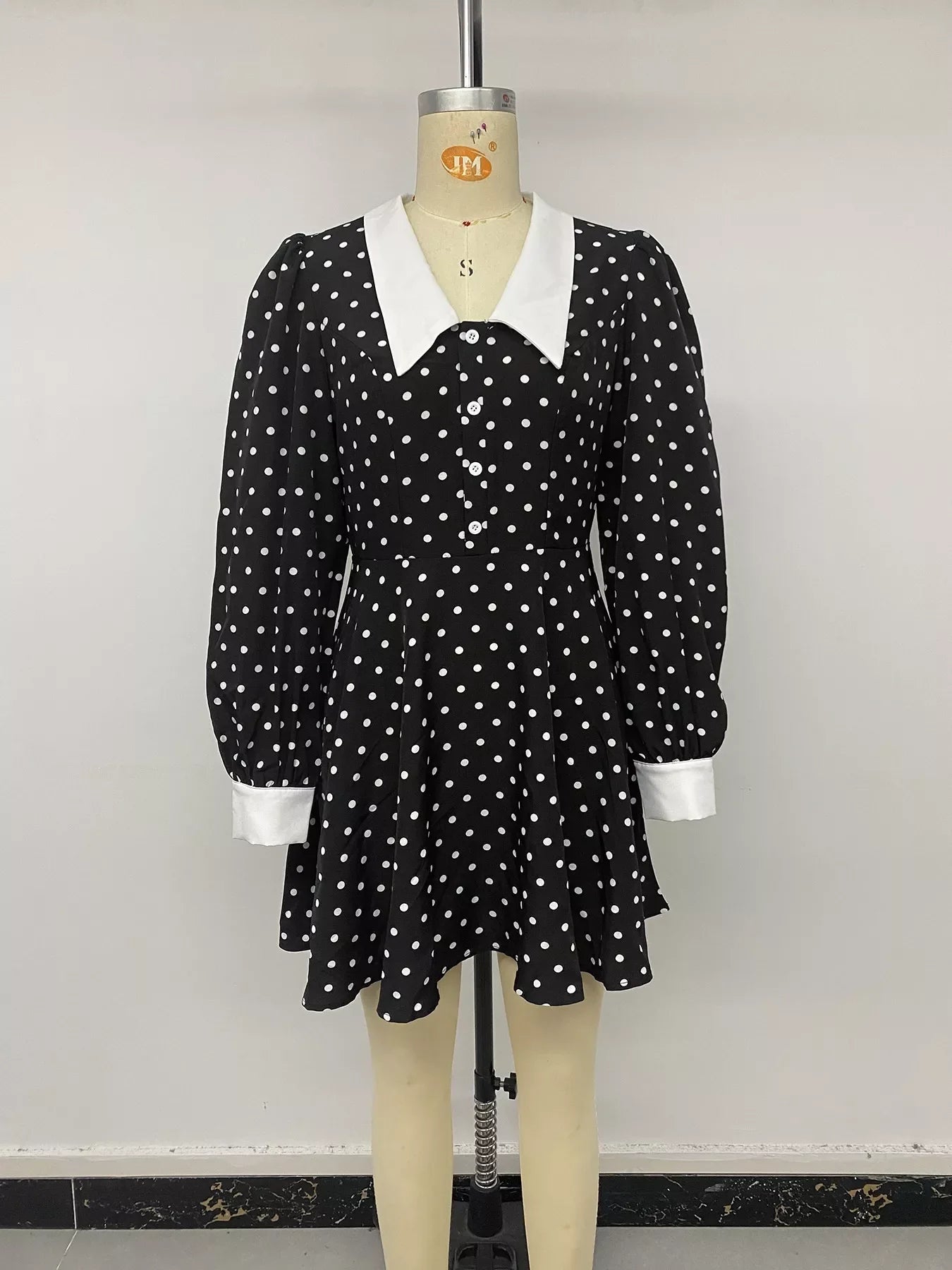 Polka dot Peter Pan collar dress by Shopimist featuring a classic black and white pattern and a flattering fit.