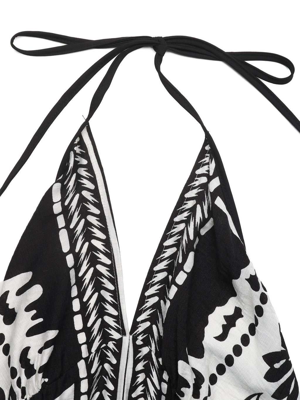 Women's printed halter neck maxi dress with tie-back detail from Plush Fashion Hub, featuring a flowing design and vibrant pattern.
