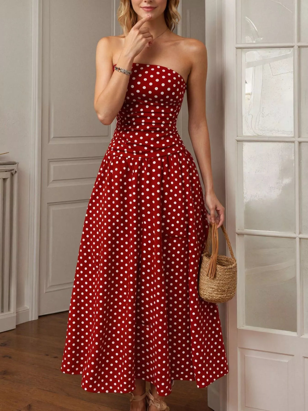 Polka dot strapless maxi dress by Shopimist featuring a flowing silhouette and bold black and white dot pattern.