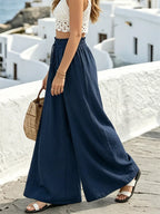 Shopimist wide leg drawstring pants made of lightweight fabric, featuring a relaxed fit and adjustable waistband.