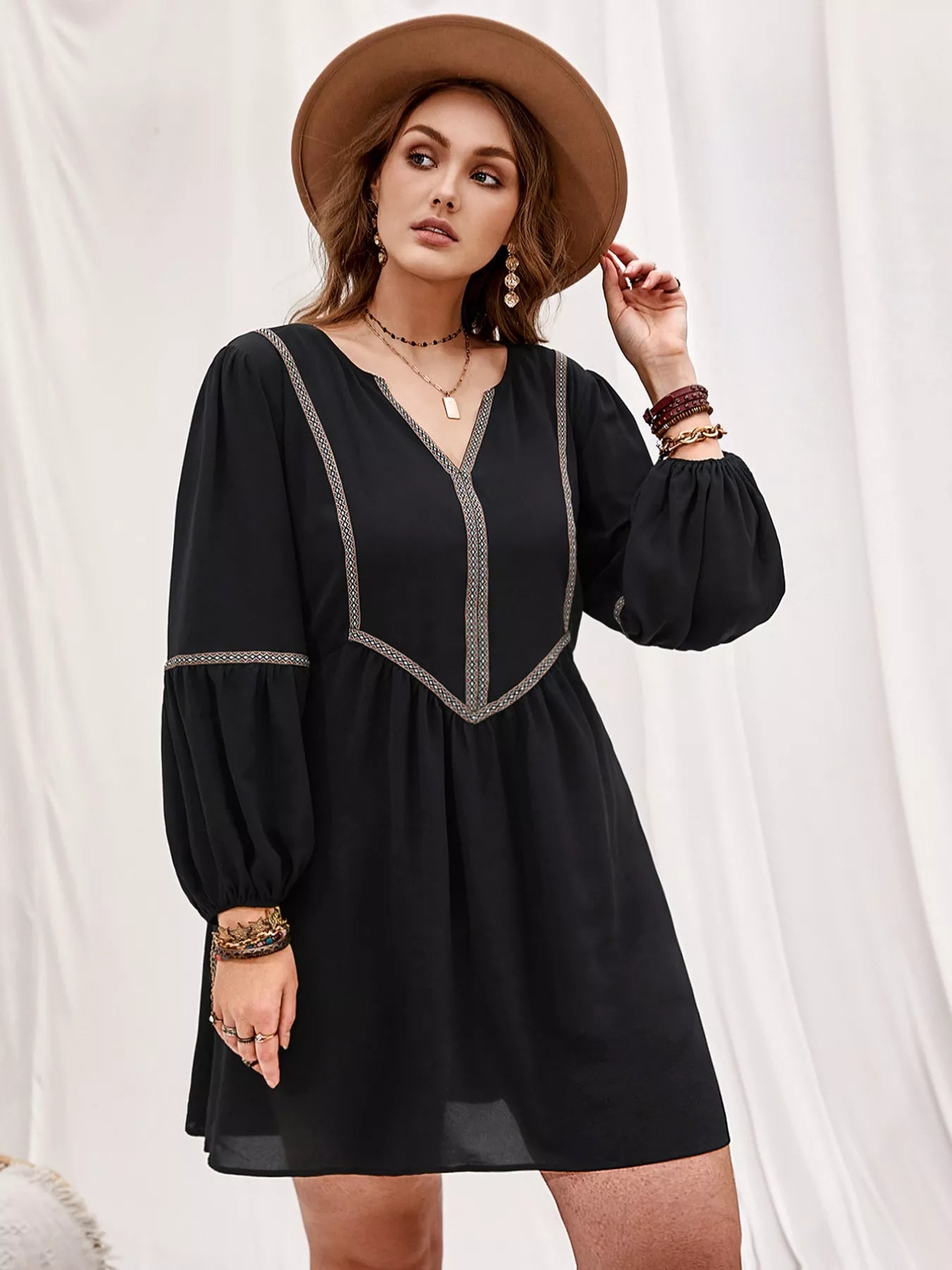 Plus size notched balloon sleeve mini dress by Shopimist, featuring a stylish silhouette and fashionable design.