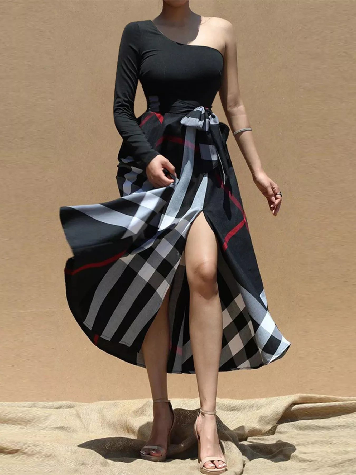 Asymmetrical one-sleeve plaid midi dress with waist tie by Plush Fashion Hub, featuring stylish design and flattering fit.