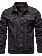 Men's VYSN long sleeve denim jacket with button-down front and classic blue denim fabric, shown on a model.