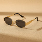 Vintage oval sunglasses with light luxury gold and silver frames, stylish eyewear by Plush Fashion Hub.