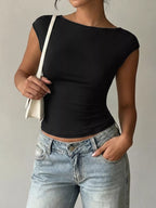 Lace detail cap-sleeve T-shirt by Trendsi, soft fabric with elegant lace accents on the sleeves and neckline.
