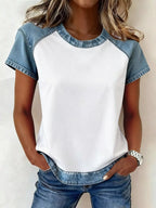 Denim patchwork short sleeve blouse by Plush Fashion Hub featuring mixed fabric patches and casual style.