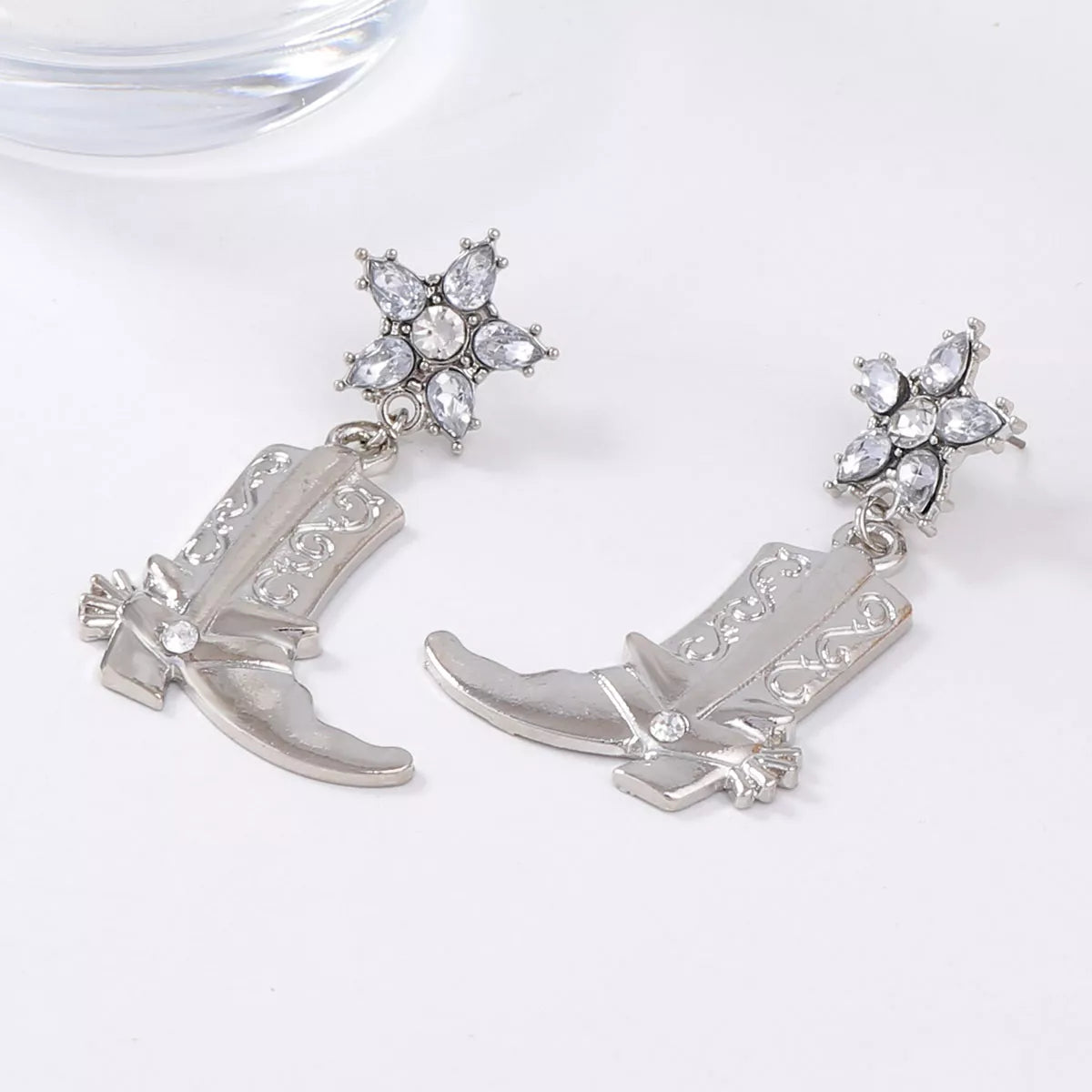 Western style dangle earrings by Shopimist featuring cowboy boot design and intricate metalwork.