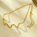 18K gold-plated wave necklace with sleek, flowing design, showcasing a stylish jewelry piece from Shopimist.
