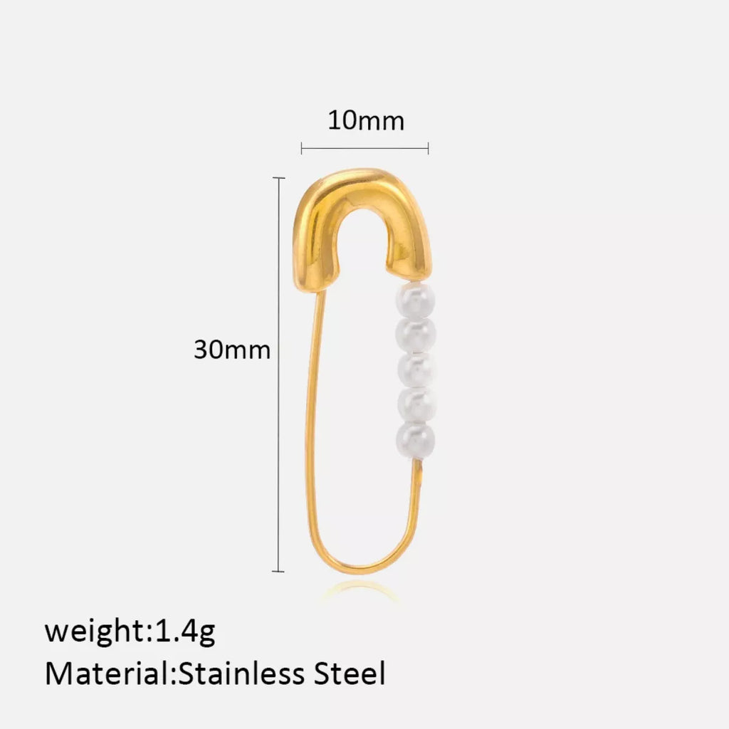 Shopimist safety pin earrings with elegant pearl accents, featuring a modern design and shiny metal finish.