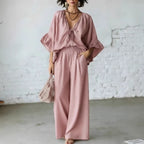 Women's loose-fit V-neck top and wide-leg pants two-piece casualwear set by FitiqueFit, featuring relaxed fit and comfortable fabric.