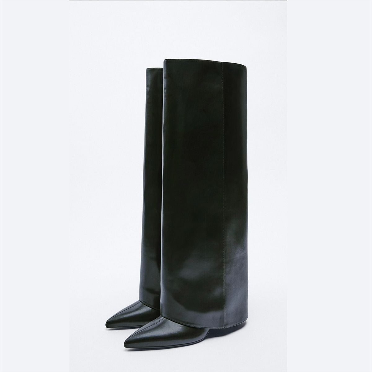 Black leather knee-high boots with wide shafts and pointed toes.