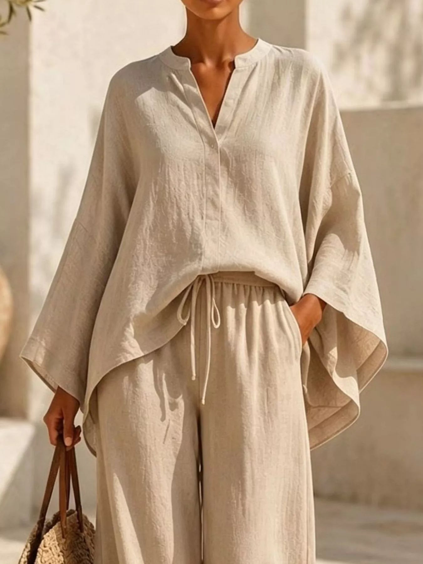 Plus size plush fashion hub loungewear set with notched long sleeve top and wide-leg pants, comfortable and stylish.