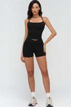 Fitglutes Activewear crop top and shorts 2-piece set, designed for gym and workout, featuring a stylish, form-fitting athletic look.