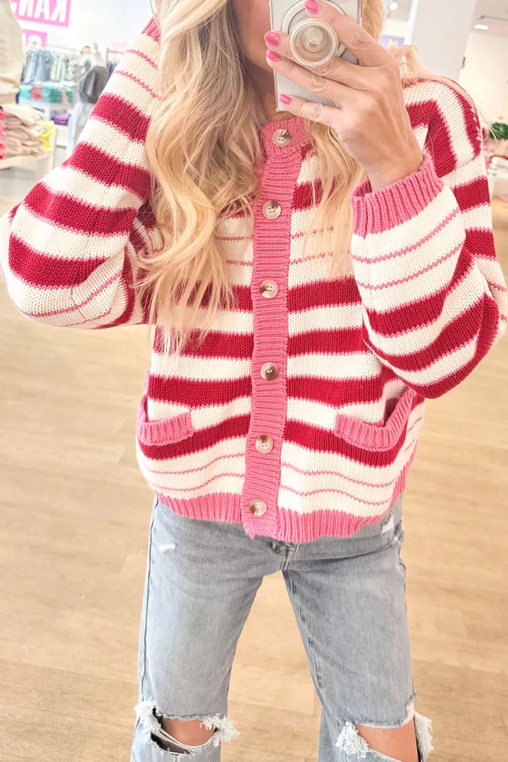 Striped V-neck long sleeve cardigan by Trendsi, featuring a regular fit and stylish design, displayed on a model.