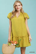 Umgee textured mini dress with ruffle hem, featuring a stylish design and lightweight fabric, perfect for casual wear.