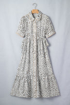 Women's leopard print button-down midi dress by Trendsi, casual chic viscose blend dress with long sleeves and a relaxed fit.