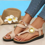 Shopimist toe loop flats sandals with open toe design and minimalist style, featuring sleek straps and comfortable flat sole.