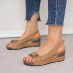 Women's comfortable peep toe wedge sandals by Trendsi, featuring a mid-heel and casual dress shoe style, ideal for warm weather.