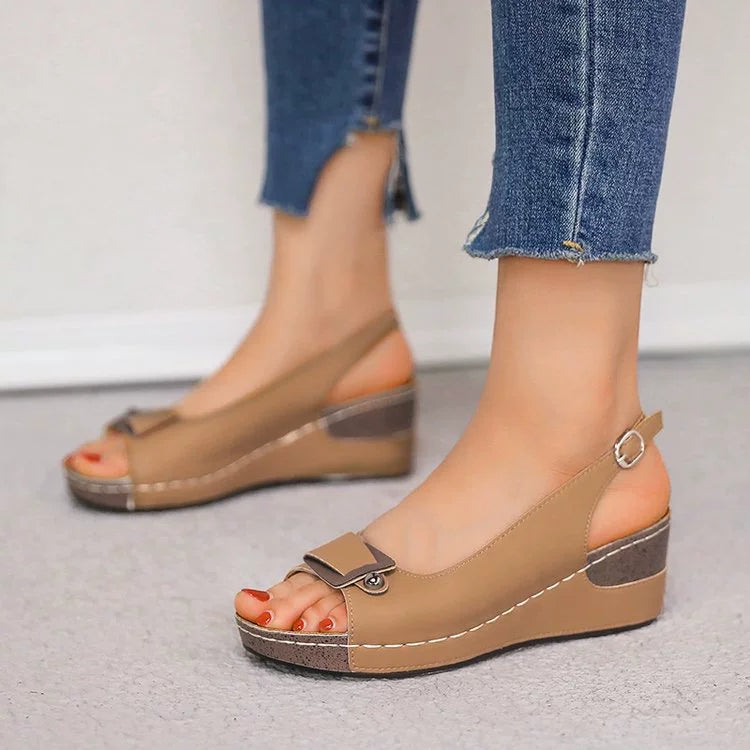 Women's comfortable peep toe wedge sandals by Trendsi, featuring a mid-heel and casual dress shoe style, ideal for warm weather.