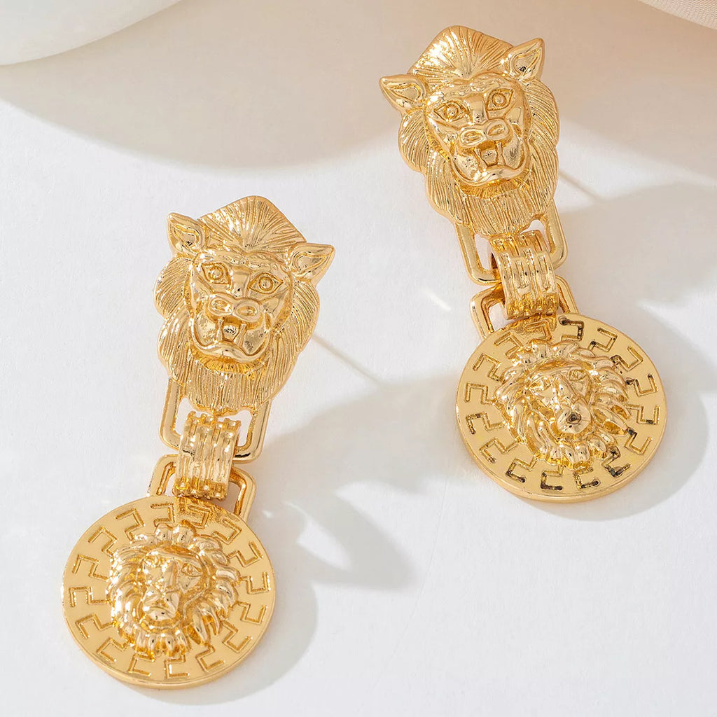 18K gold-plated lion head medallion drop earrings with intricate detailing and bold design for a striking jewelry statement.