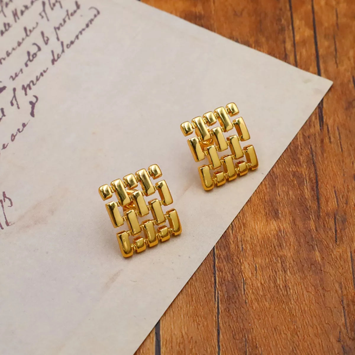 18K gold-plated geometric stud earrings with modern angular design, crafted by Shopimist.