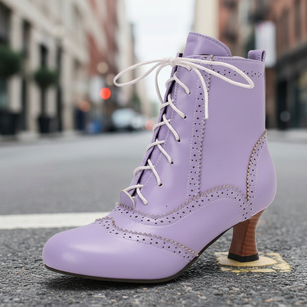 Women’s Dopamine Girl short boots by Plush Fashion Hub featuring comic-con style winter footwear with bold graphic designs and black accents.
