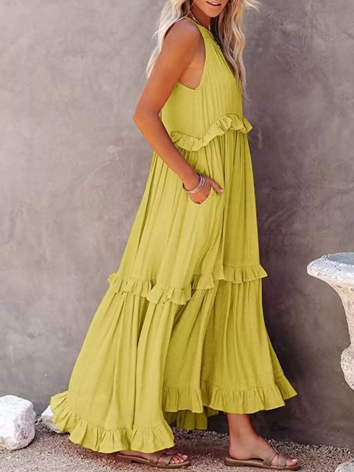 Plush Fashion Hub ruffled tiered sleeveless maxi dress with flowing fabric and layered design, perfect for summer wear.