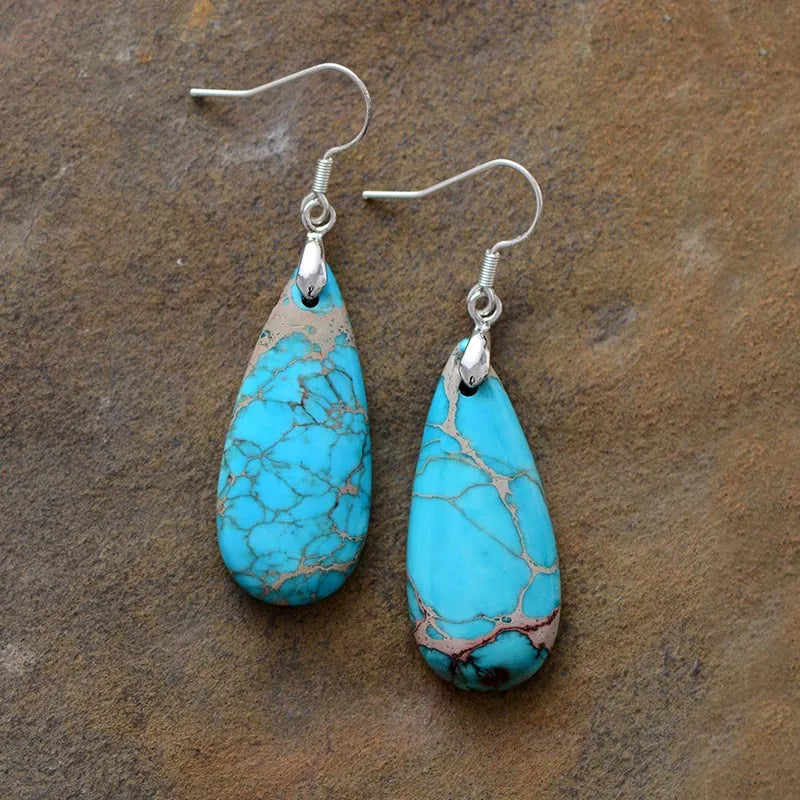 Natural stone copper teardrop earrings with elegant design, featuring polished copper and smooth stone drops for stylish jewelry.