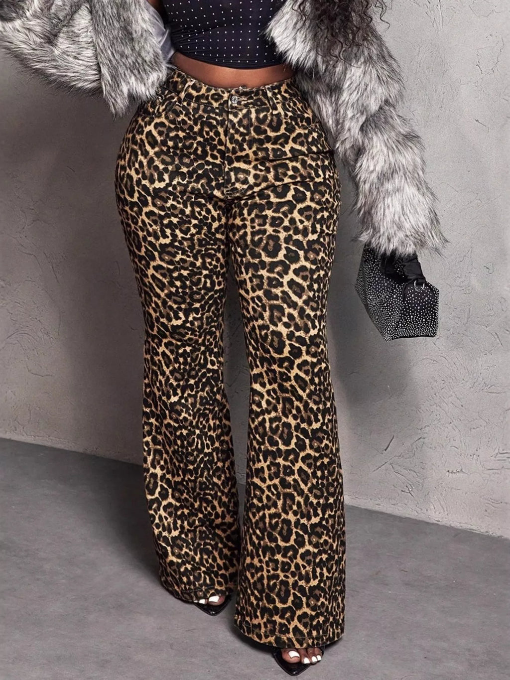 Leopard print wide leg pants from Shopimist with a relaxed fit and high waist, displayed on a neutral background.