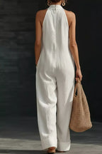 Women's sleeveless wide-leg jumpsuit with pockets by Trendsi, featuring a casual, chic design and relaxed fit.