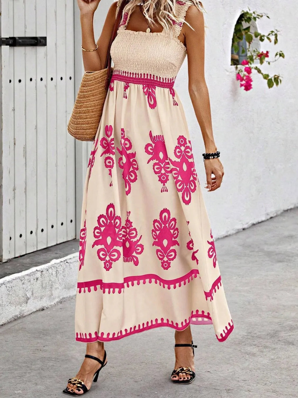 Plush Fashion Hub smocked printed wide strap maxi dress featuring a flowing design and vibrant floral pattern.