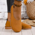 Shopimist round toe flats slip-ons in neutral color, featuring a sleek design and comfortable fit, suitable for casual or office wear.