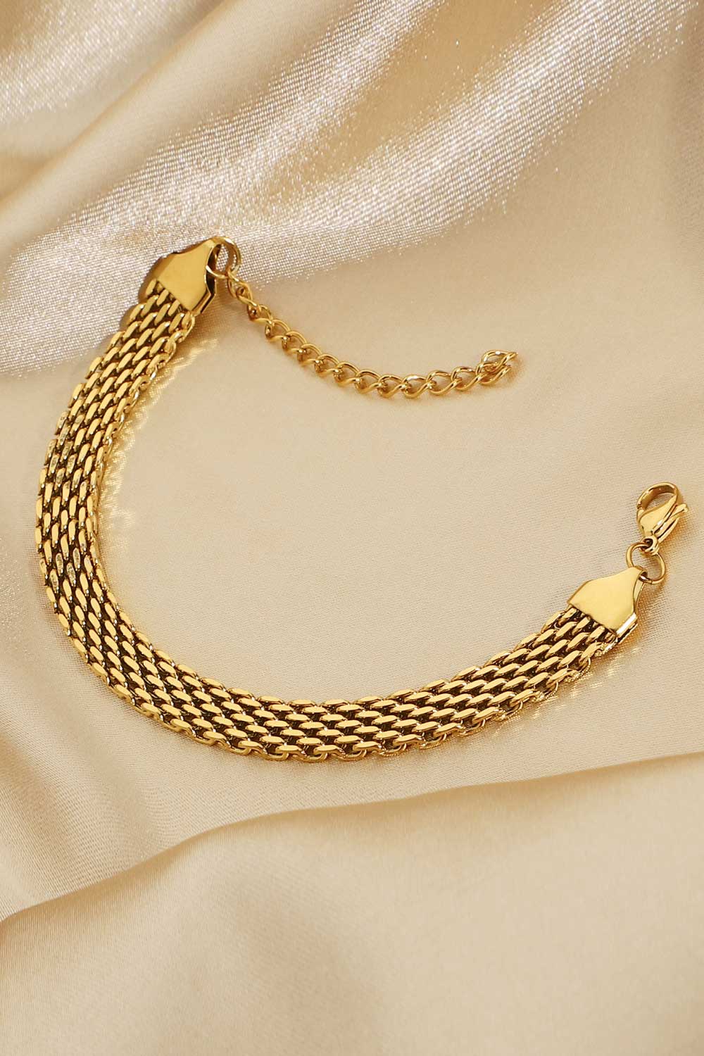 18K gold-plated wide chain bracelet with bold links, stylish jewelry accessory, shiny finish, and secure clasp.