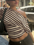 Women's striped one-shoulder T-shirt by Trendsi, featuring a chic asymmetrical design and comfortable fit.