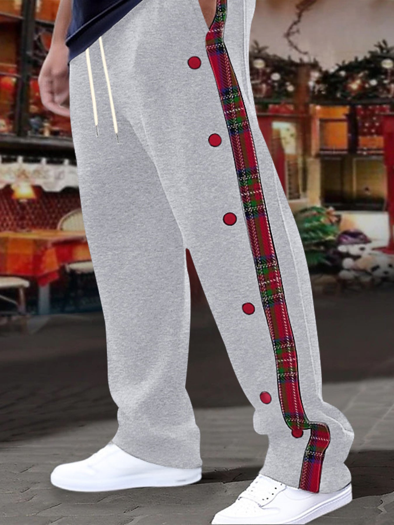 Men's plus size plaid trim snap-button track pants by Shopimist, showing black track pants with plaid accents and snap buttons.