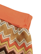 Women's zigzag knit tank top and shorts two-piece lounge set by Trendsi, featuring a cozy, stylish knit fabric in a vibrant zigzag pattern.
