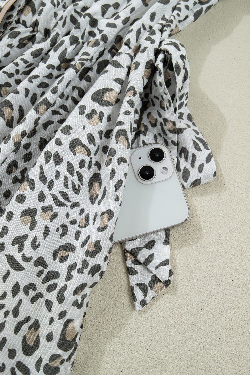 Women's leopard print button-down midi dress from Trendsi, casual chic viscose blend dress with long sleeves and a relaxed fit.