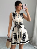 Sleeveless ruched printed tie waist dress by Shopimist, featuring a flowy design with a floral pattern and adjustable waist tie.
