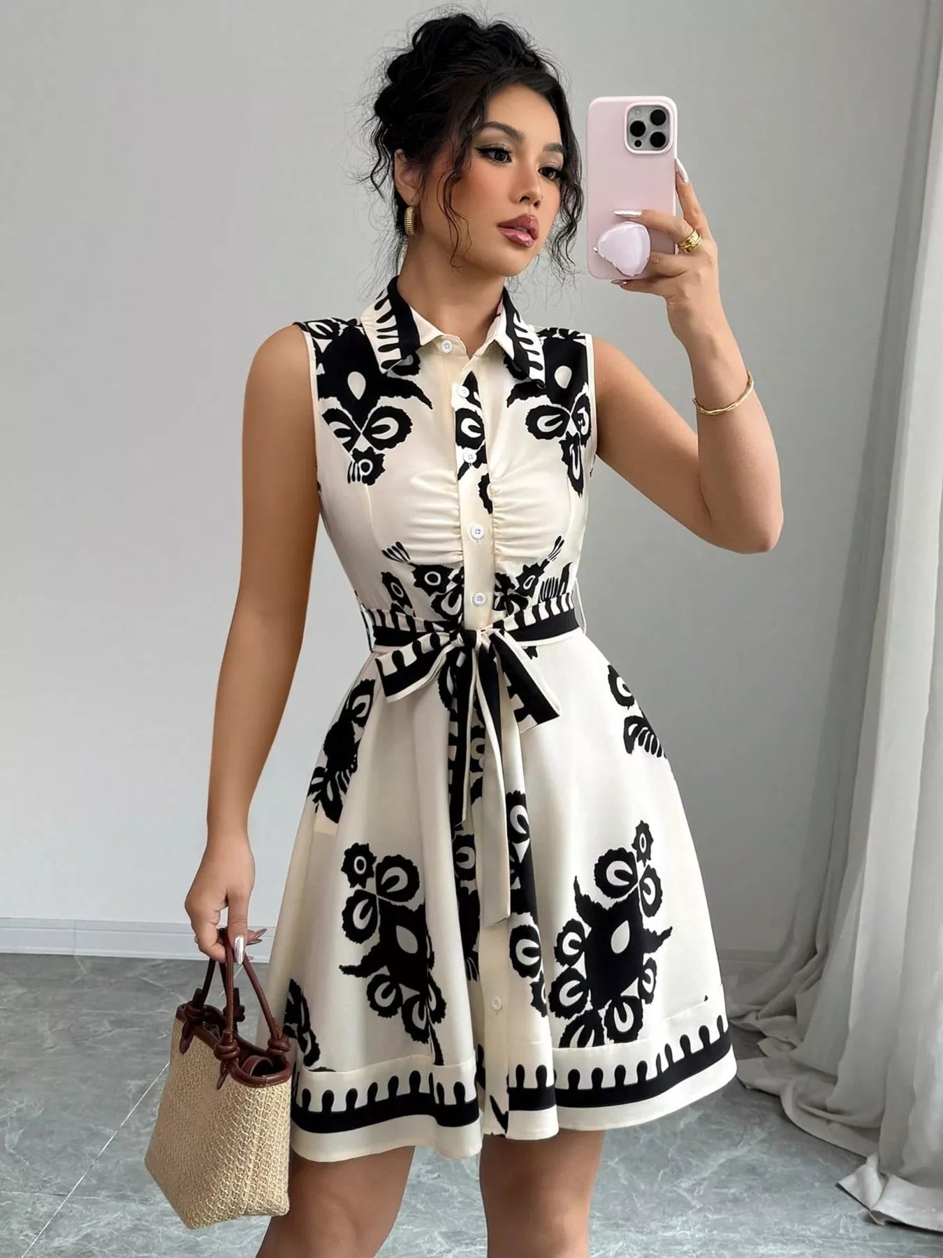 Sleeveless ruched printed tie waist dress by Shopimist, featuring a flowy design with a floral pattern and adjustable waist tie.