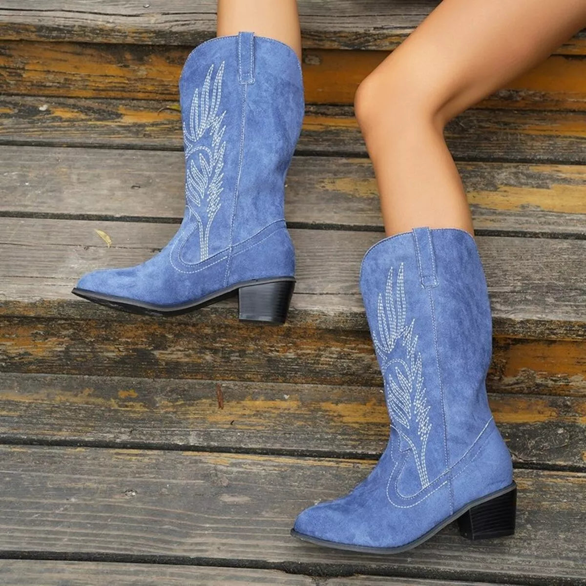 Point toe block heel boots by Trendsi, stylish black boot featuring a sleek pointed toe and sturdy block heel.