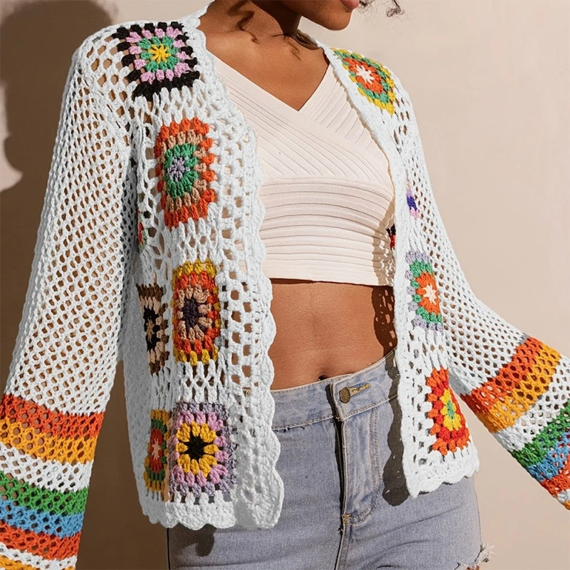 Women's elegant crochet cardigan by FitiqueFit, showcasing intricate knit pattern and lightweight, stylish design.